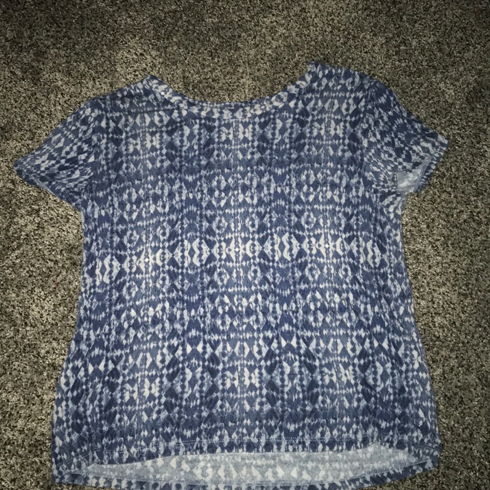 Patterned shirt.